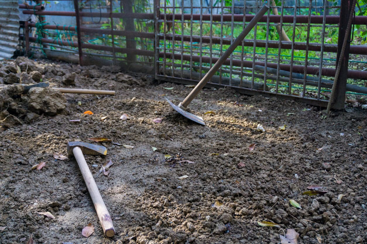 Gardening tools on clay soil